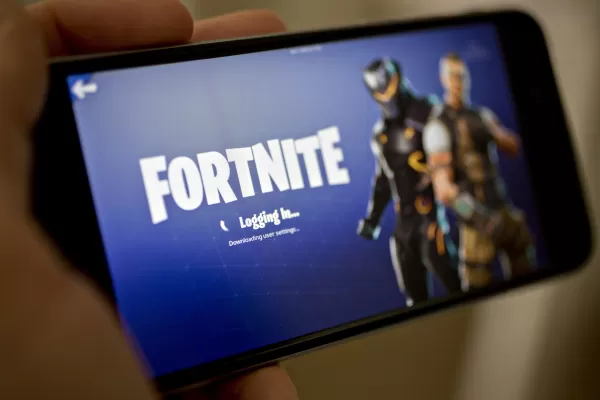 Fortnite is finally set to return to iPhones in the U.S., nearly five years after the game was pulled. Photographer: Andrew Harrer/Bloomberg via Getty Images.